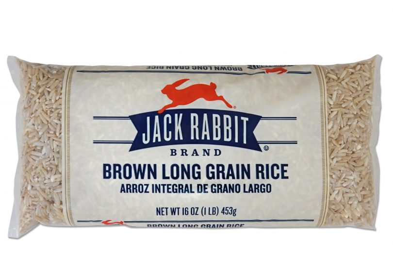 16 ounce bag of Jack Rabbit Brand Brown Long Grain Rice. Clear bag with tan background and Jack Rabbit Logo.